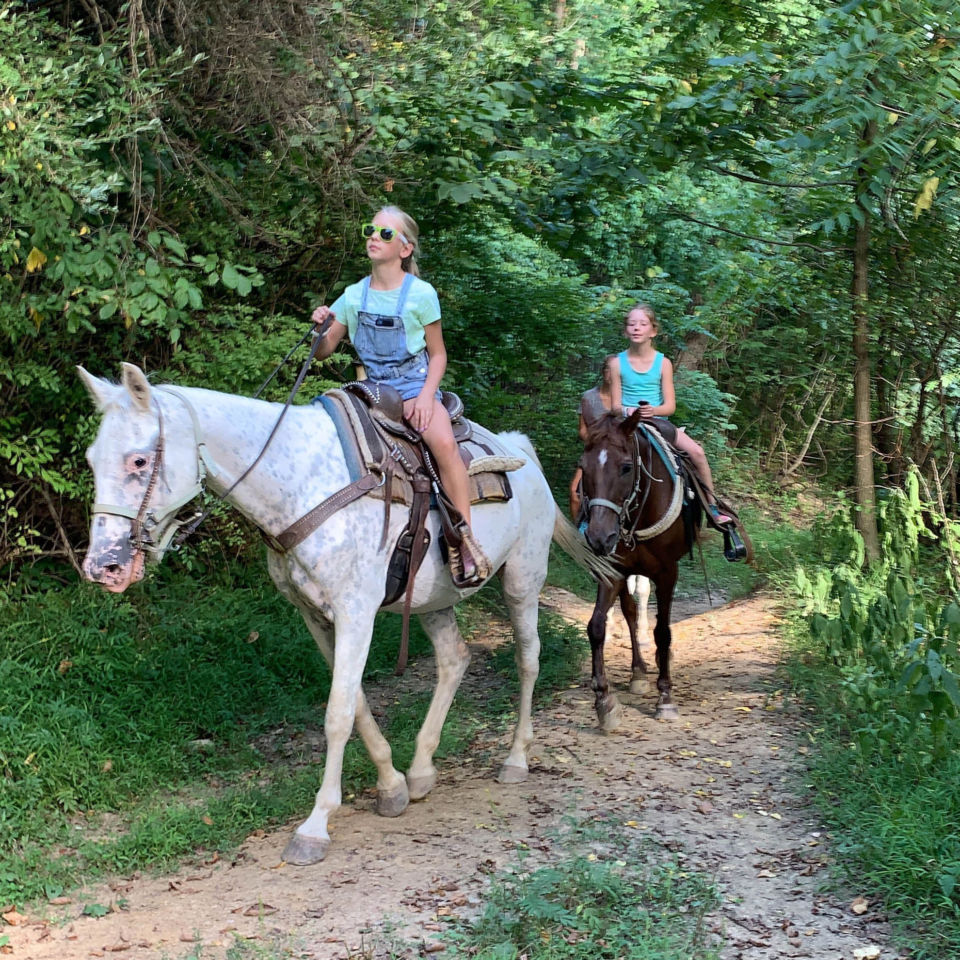 Girls Riding Horses